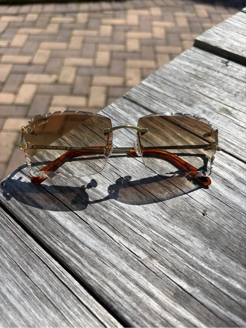 Cartier Men's Rimless Sunglasses with Gold Frame and Brown Lenses